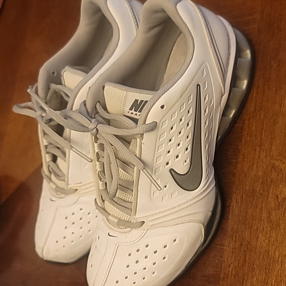 Nike sneakers womans size 8.5. White and silver